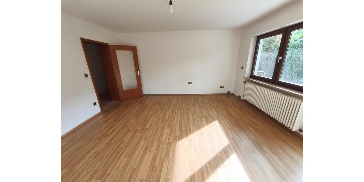 Wohnzimmer mit Zugang zu Terrasse / Garten Bild 3